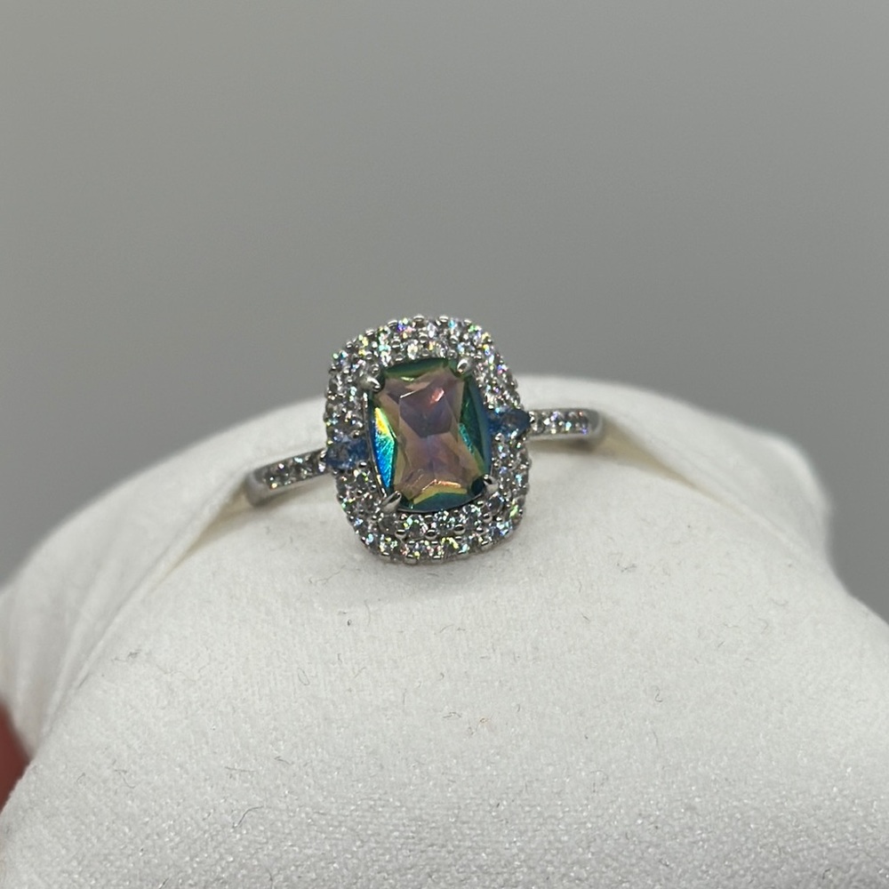 Silver and Blue Halo Ring with Cushion-Cut Gemstone